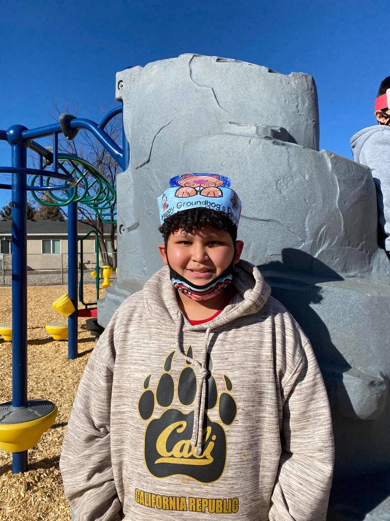 A boy with Happy Groundhog Day hat